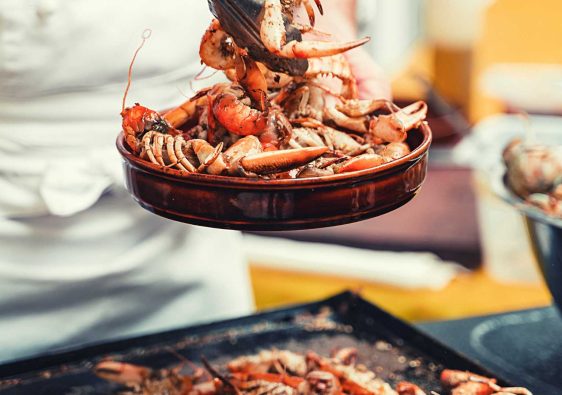 Chris Taylor from Frasers Restaurant cooking yabbies at Farmer On Your Plate in 2022